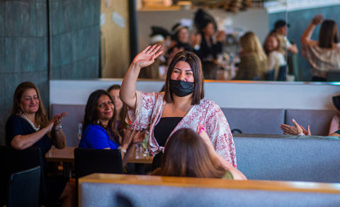 Jenasey Martinez waving