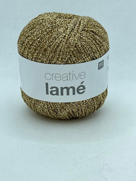 Illuminate your creativity with our Reflective Deep Beige yarn