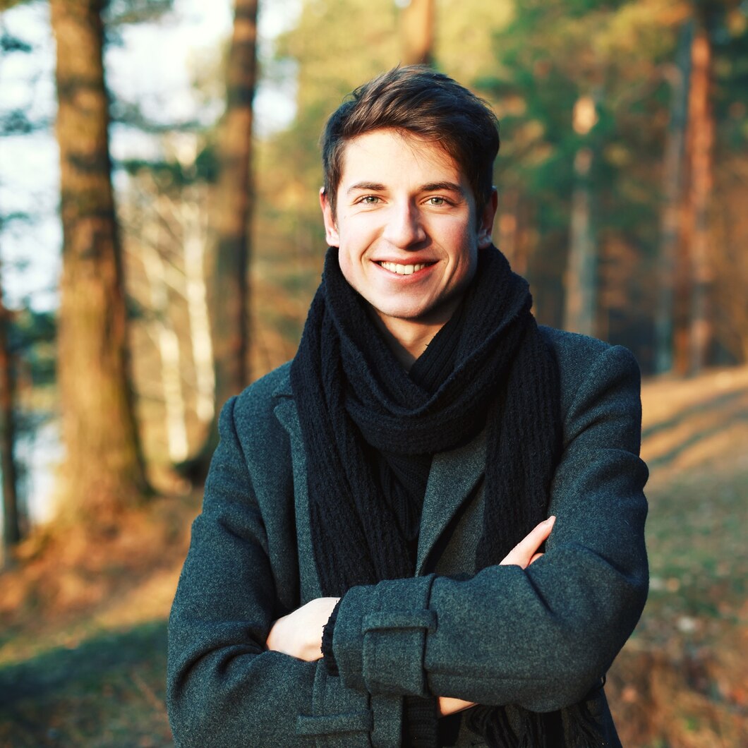 smiling-young-man-with-crossed-arms-outdoors_1140-255.jpg__PID:930ef16f-620e-417a-9e89-47934c67b15d