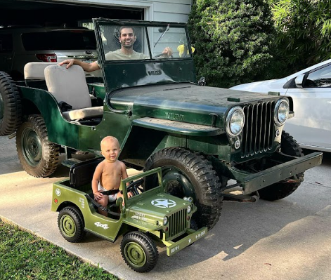 Father and Son riding their own version of the Vintage Military Truck Electric Power Wheel Ride On For Kids