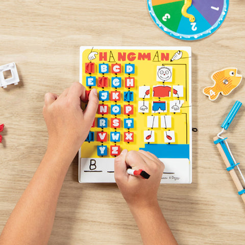 Melissa & Doug 30 Best Childhood Games to Share with Kids Today blog post Flip-to-Win Hangman Travel Game