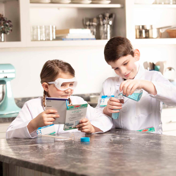 https://cdn.shopify.com/s/files/1/0550/8487/5830/products/Scientist-Role-Play-Set-008536-1-Kid-Lifestyle_750x.jpg?v=1664907126