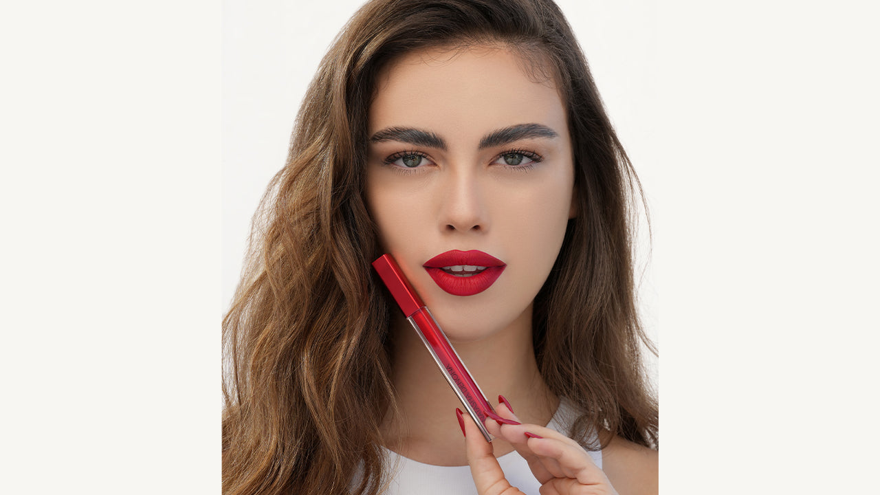 Introducing the I NEED A ROUGE MATTE LIQUID LIPSTICK in shade EVA}
