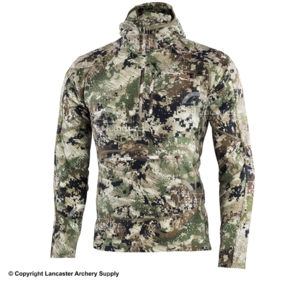 The SITKA Gear Apex Hoody in the brown, green, and black Subalpine Camo.