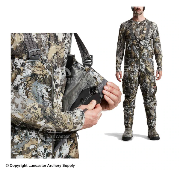The SITKA Gear Aerolite Bib showing a hunter placing his phone in an inner pocket.