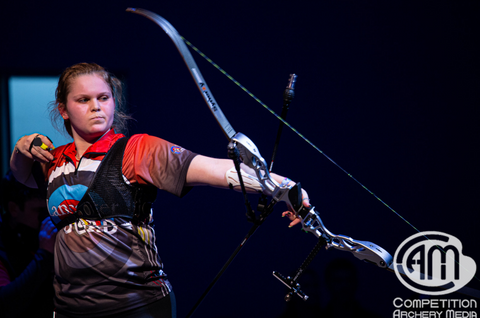Alyssa Artz wearing a Lancaster Archery JOAD jersey follows through her shot process on the Finals Shoot-Up Stage. 