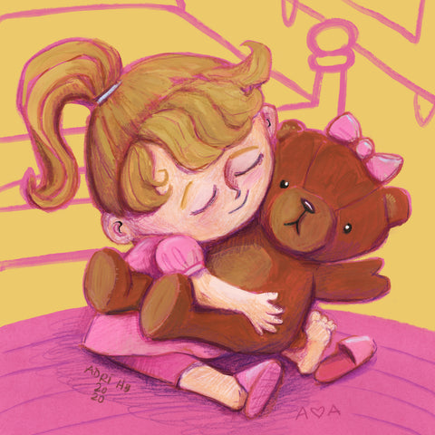 girl comforted by teddy bear