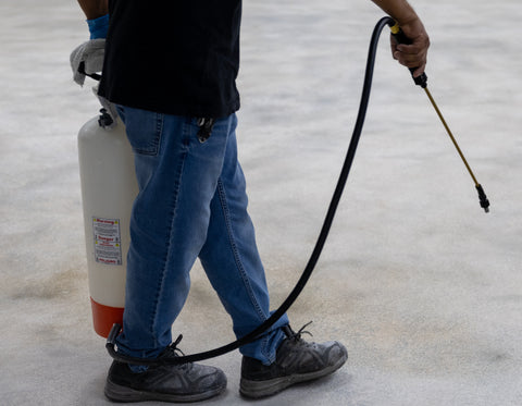 An image of an epoxy flooring contractor installing a Sol-Gel resin solution.