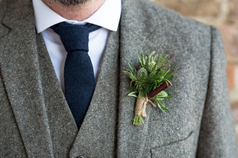 Groom with boutonnière of Irish green