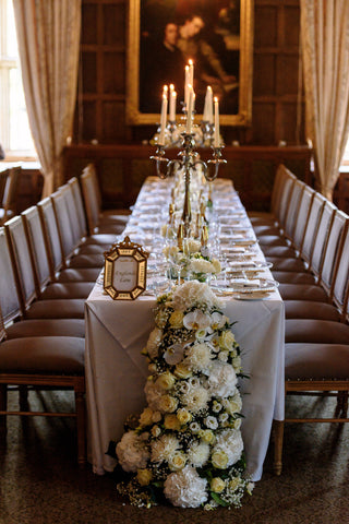 Wedding table decor with cascading flowers