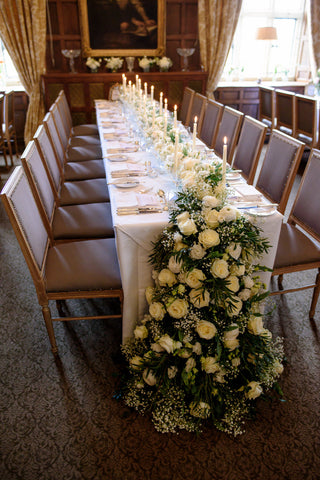 Wedding flowers I nan Irish Castle banqueting hall.