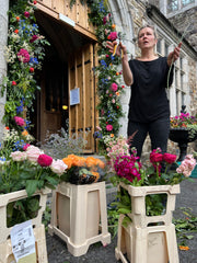 Lamber de Bie Flowers creating wedding arch in Waterford Castle Hotel