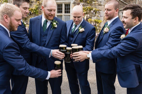 An Irish wedding toast in front of the castle