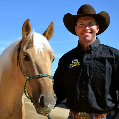 Team Absorbine Rider Brad Barkemeyer holding a horse