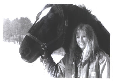 Jamie Young, great granddaughter of Absorbine Inventors with Goth, her rescued Percheron gelding Absorbine Blog