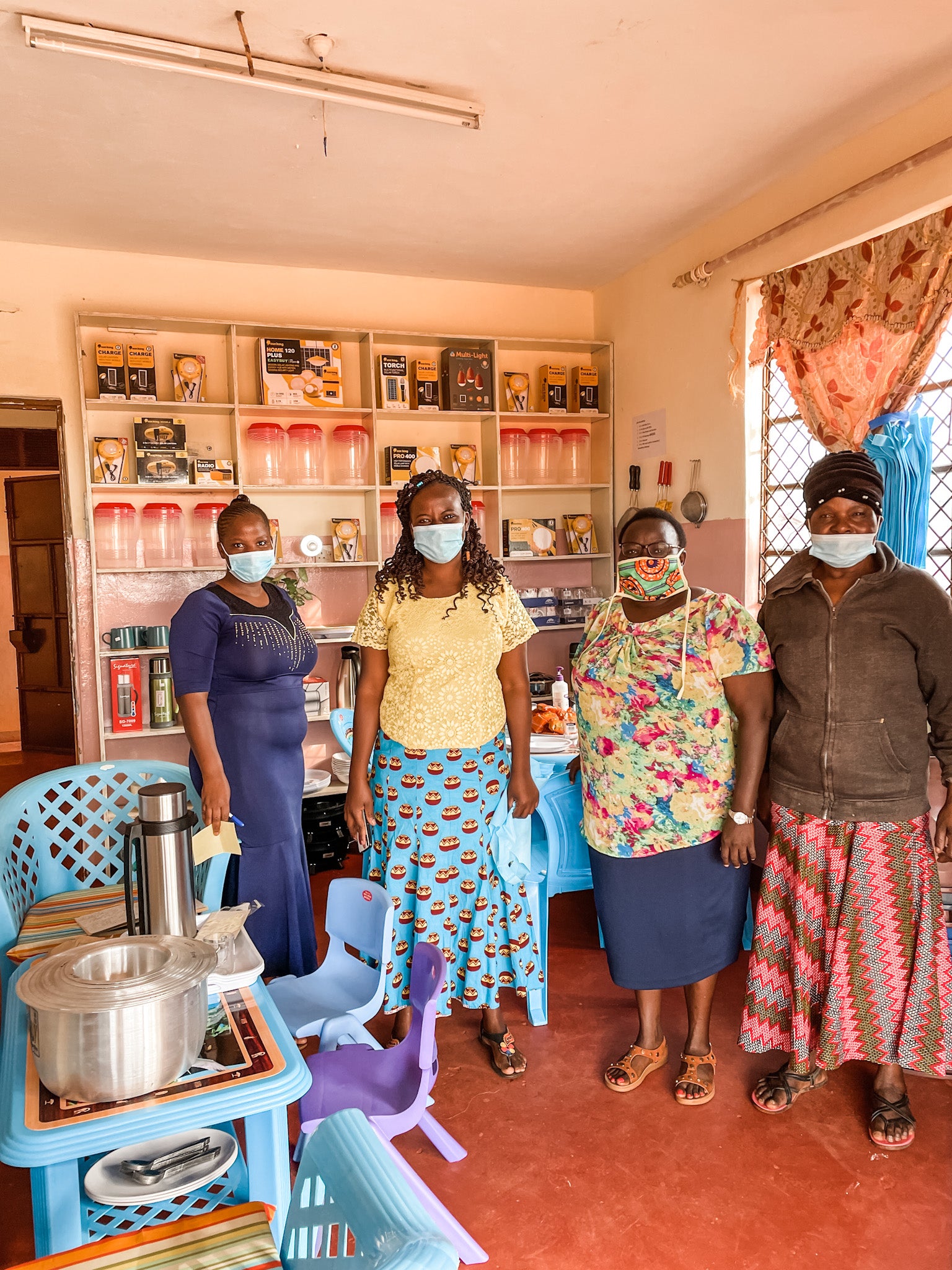 The Zawadisha team poses for a photo inside of our new shop in Kenya