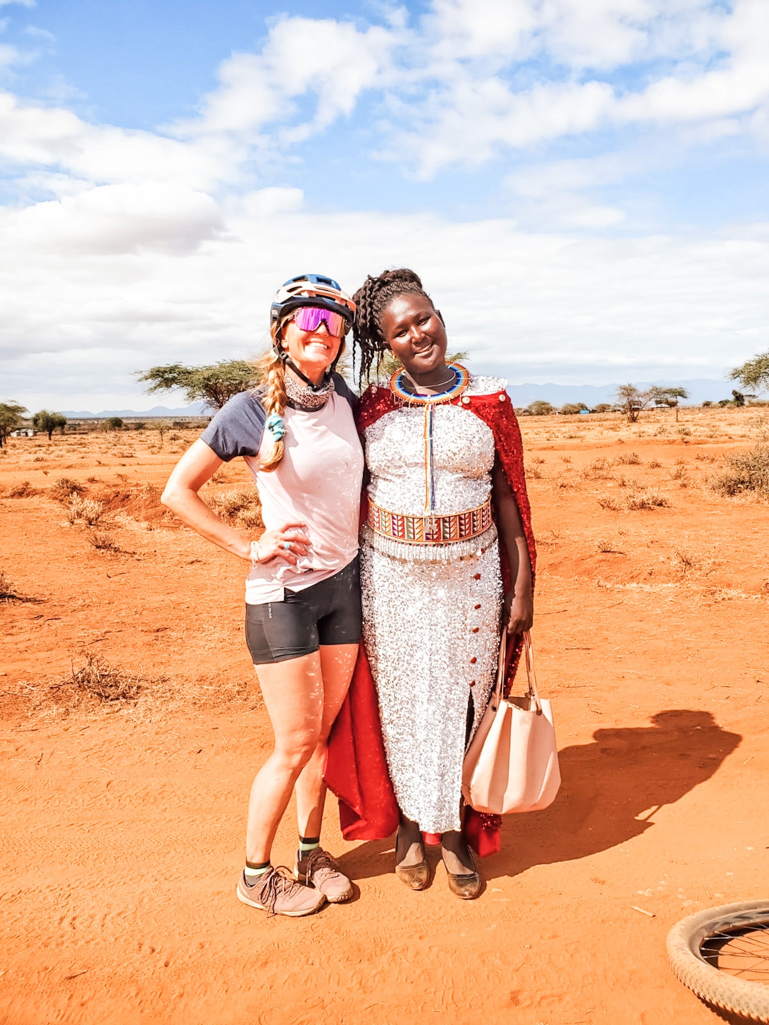 Meeting a local Kenyan woman while cycling through Kenya