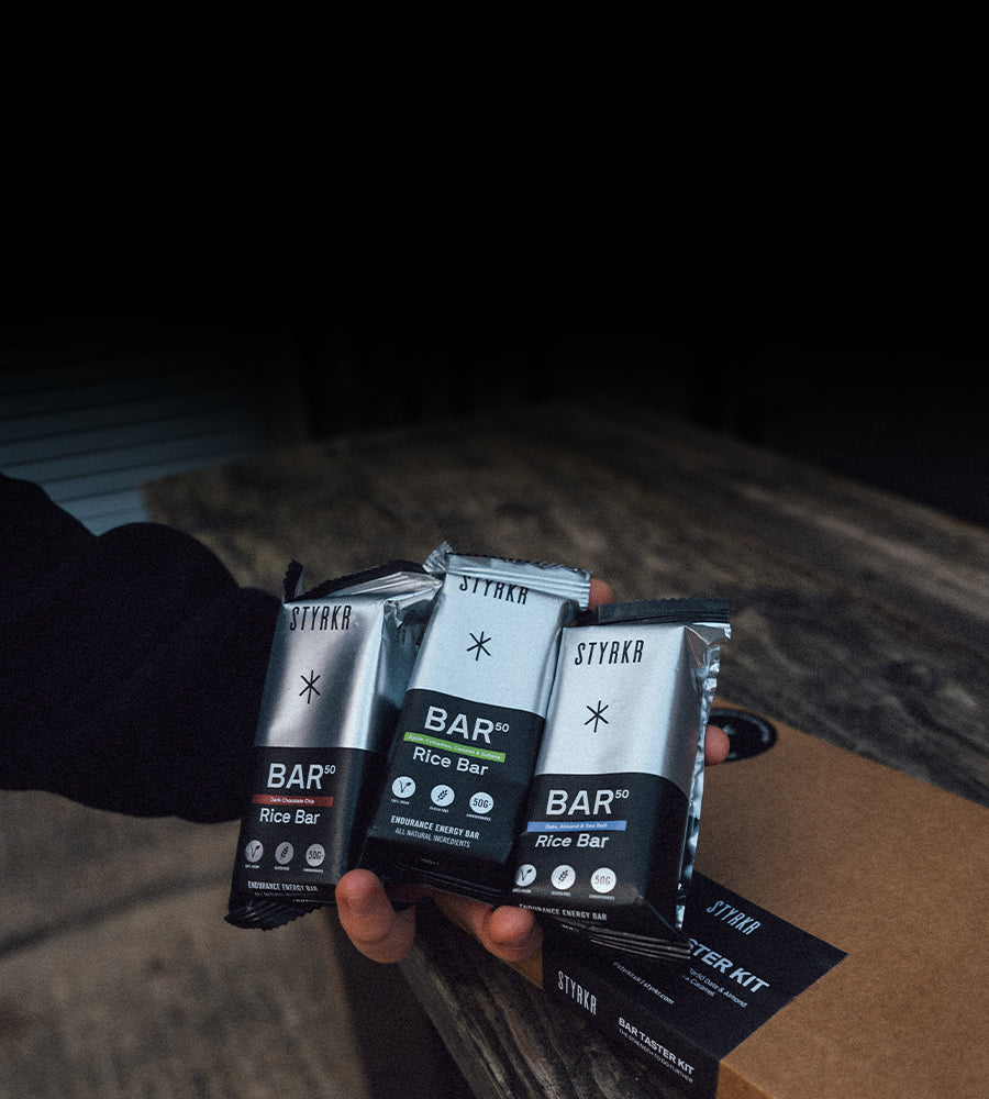 Styrkr energy bars in mans hands