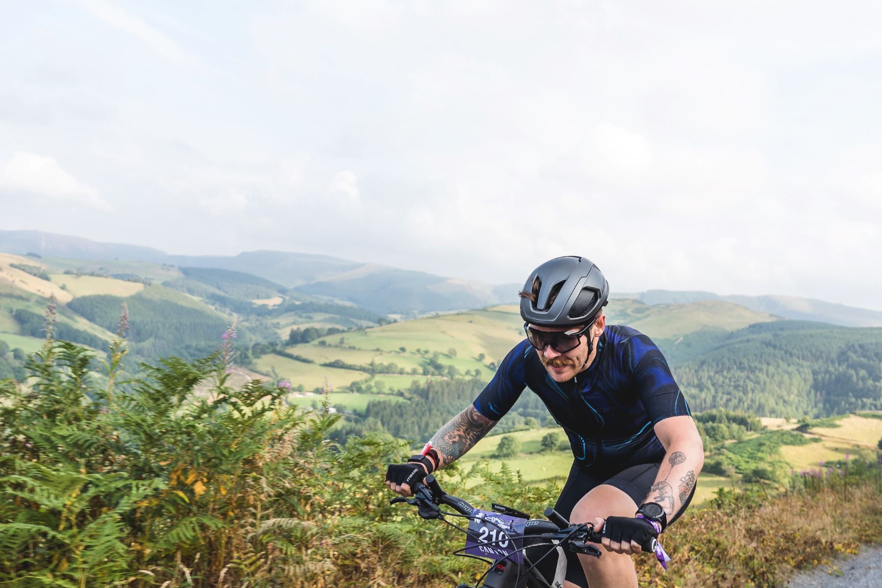 chris hall rides in race through beautiful countryside view