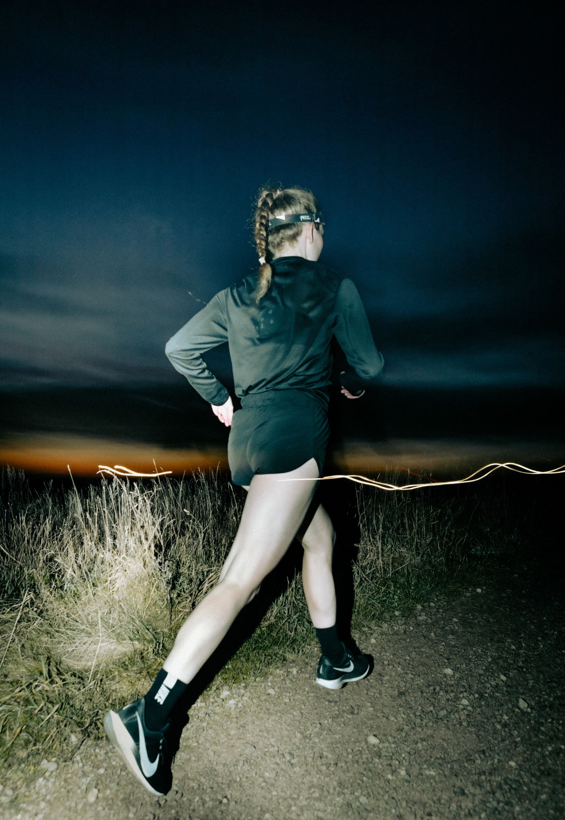female athlete running with good posture
