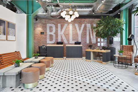 Hotel Brooklyn Manchester reception with biophilia and accessible desk