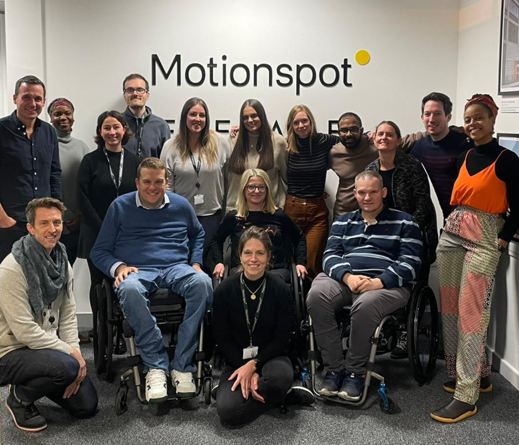 Motionspot team smiling in the motionspot office