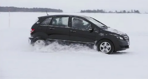 car driving on icy road