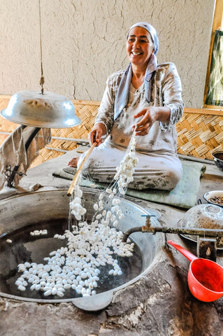 lady making ikat