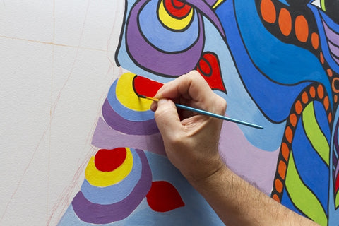 Painting with a brush is an easy mural painting technique