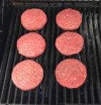 Put the stuffed burgers on the grill