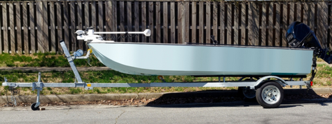 Fishing Boat on Boat Trailer with Bunk Boards