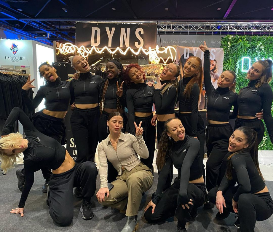 Dancers at DYNS Move IT 2022 stand.