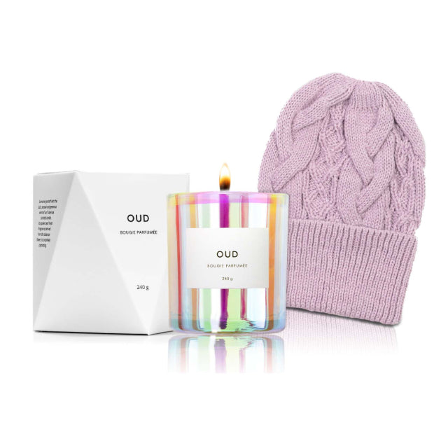 A pink toque and a candle