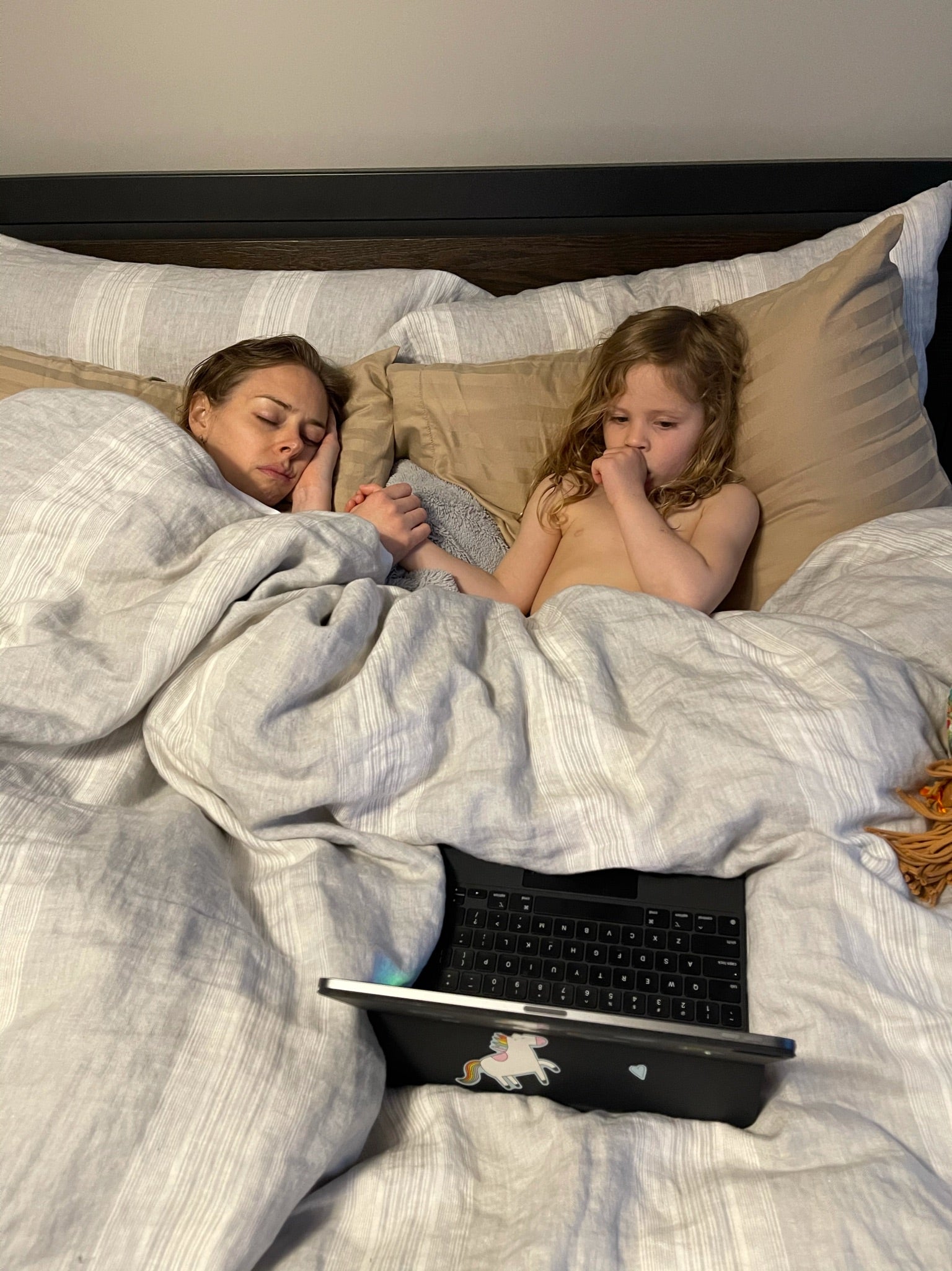 Jordan grieves with her daughter in bed as she slowly progresses through the stages of recovery.