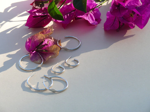 silver signet hoops with flowers and shadows