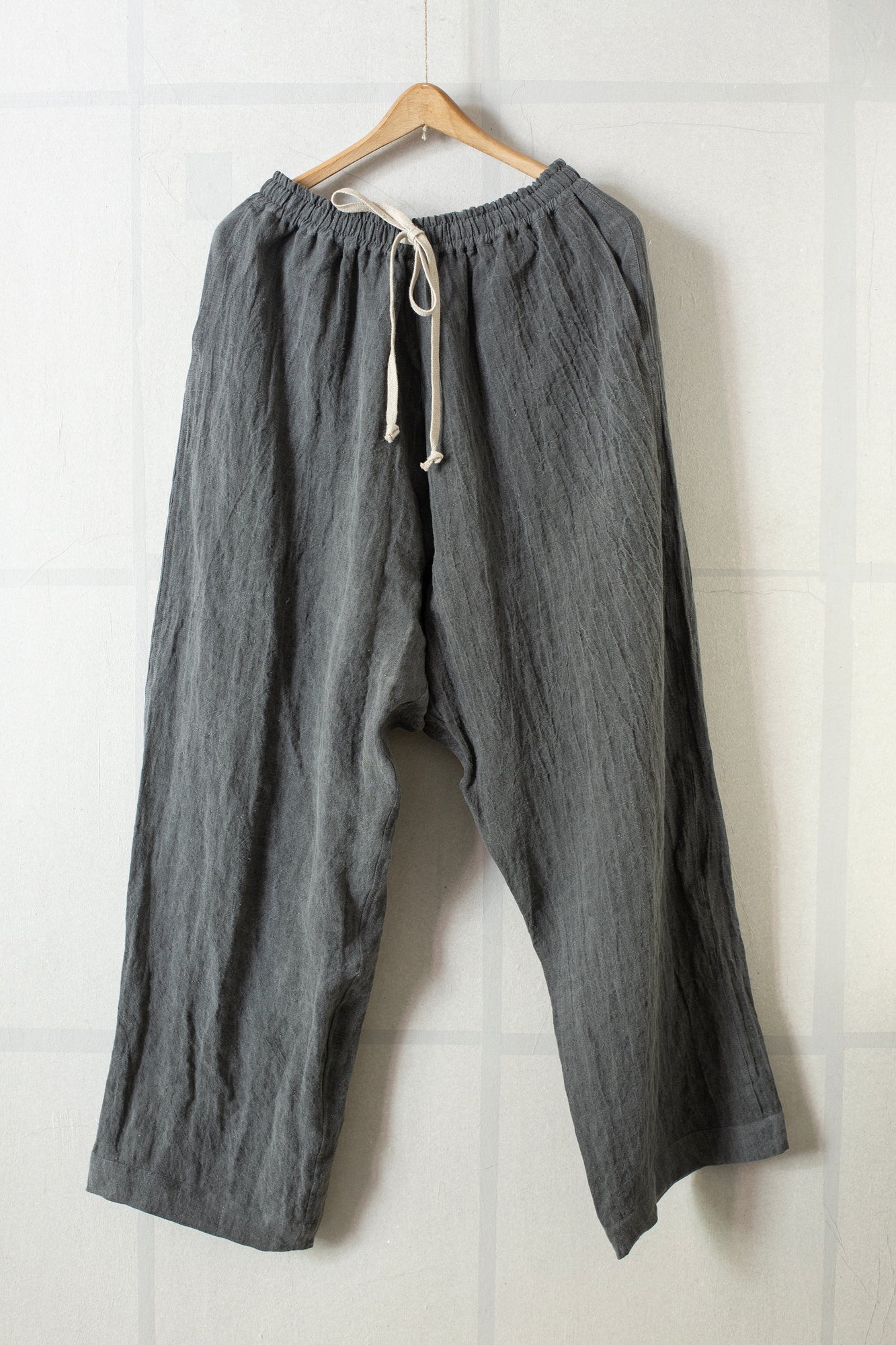 Dark Sumi Dyed Flax Lawn Jogging Trousers by O-Project · Atelier