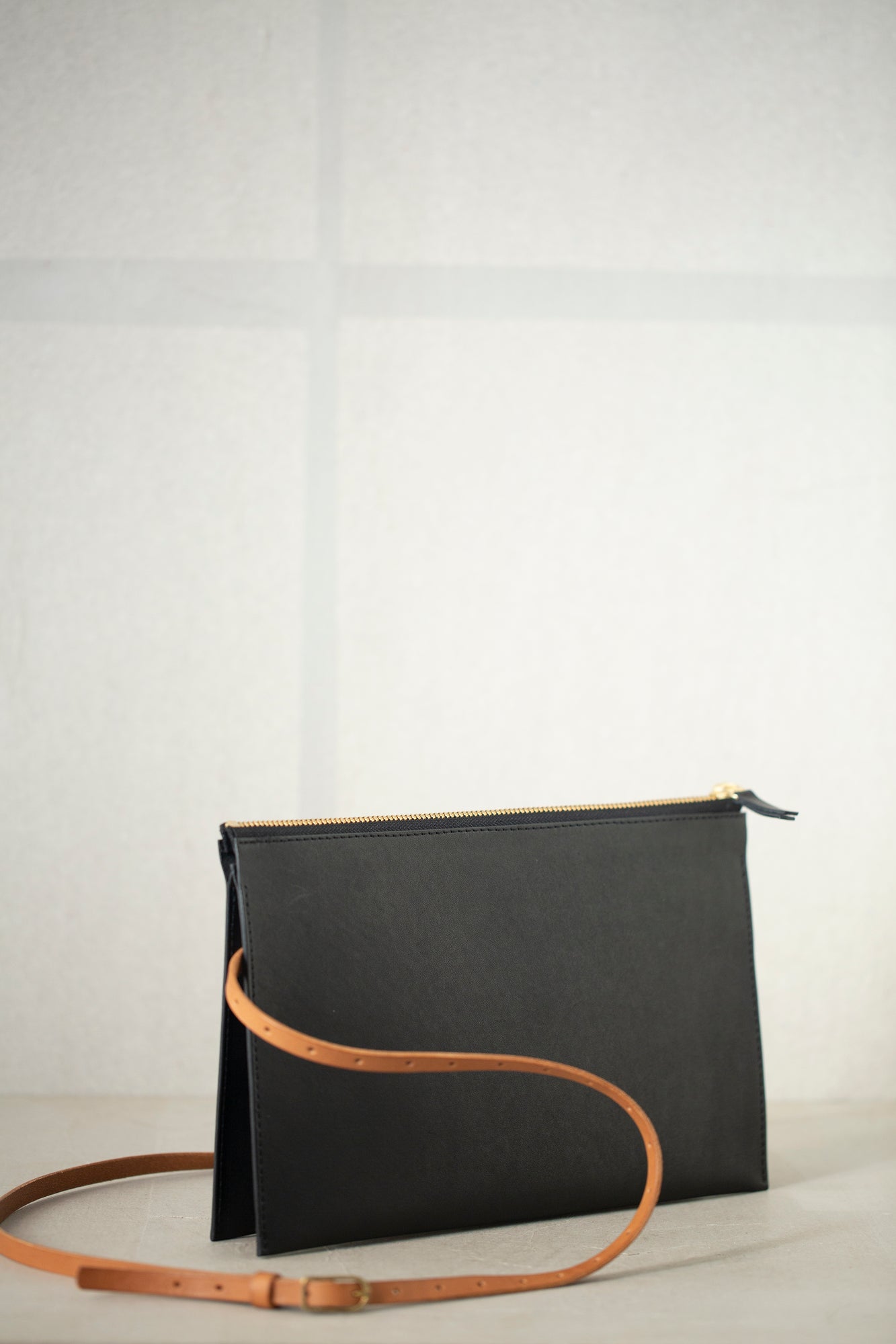 Black evening bag with shoulder strap