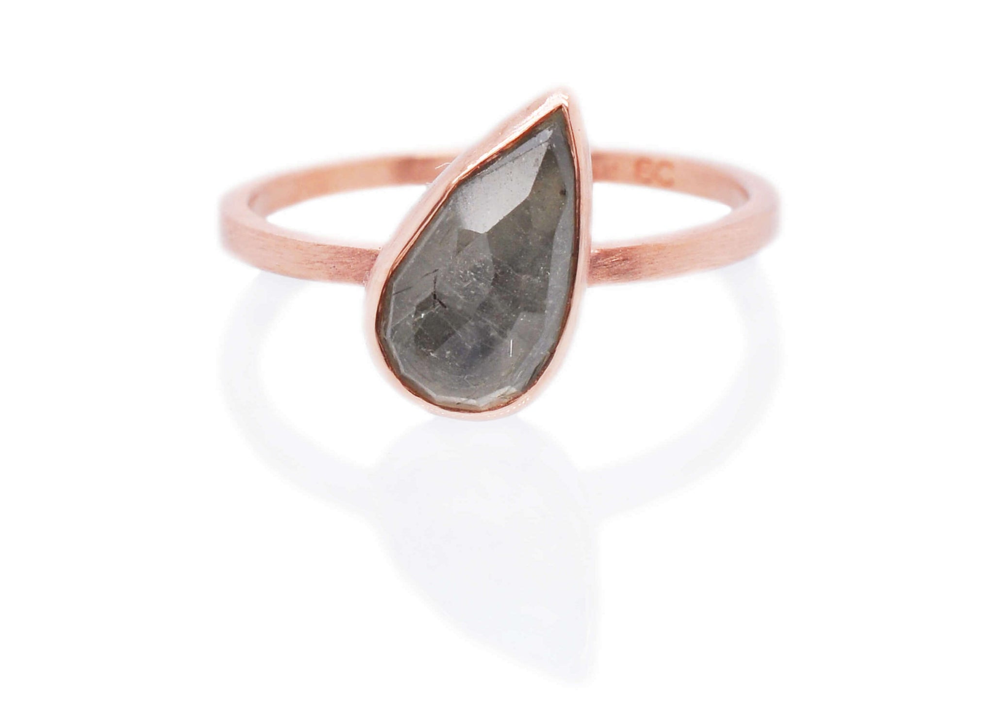 Handmade sapphire engagement ring in rose gold.