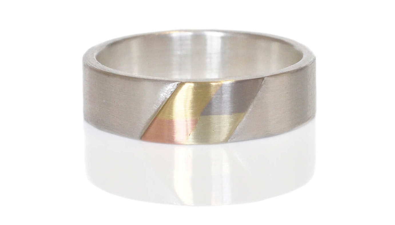 Mixed metal wedding band for him/them.