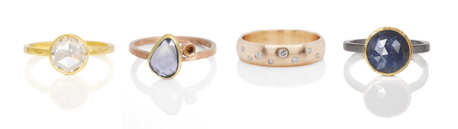 Mixed metal diamond and sapphire rings from EC Design Jewelry in Minneapolis, MN.