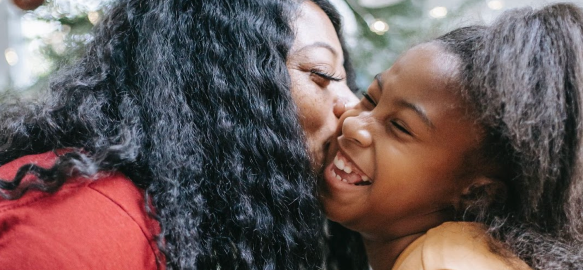 Mother and daughter happy at Christmas