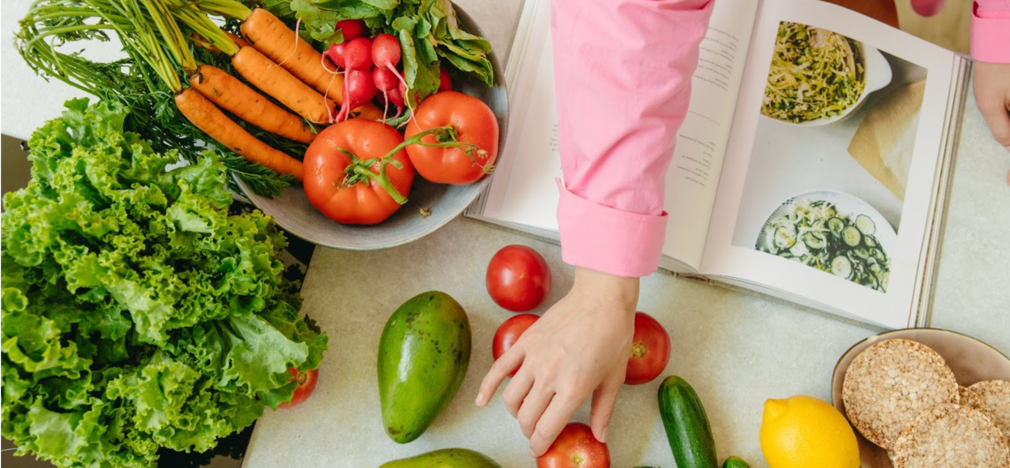 Vegetables and recipe book or cookbook for Veganuary