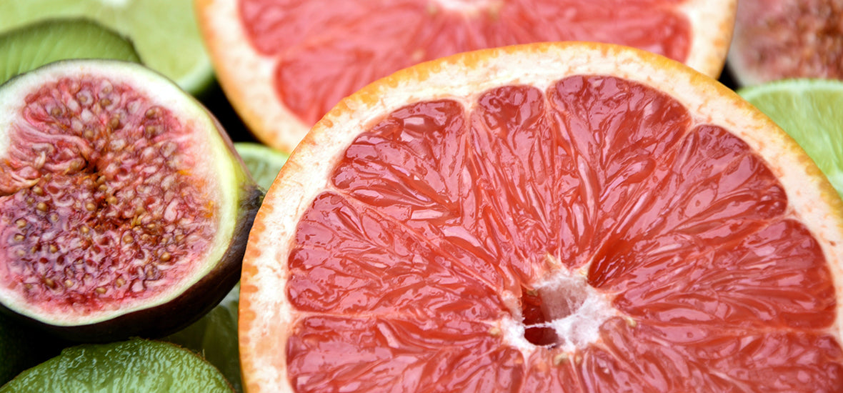 Slices of limes, pomegranate and red grapefruit rich in vitamin C for collagen.
