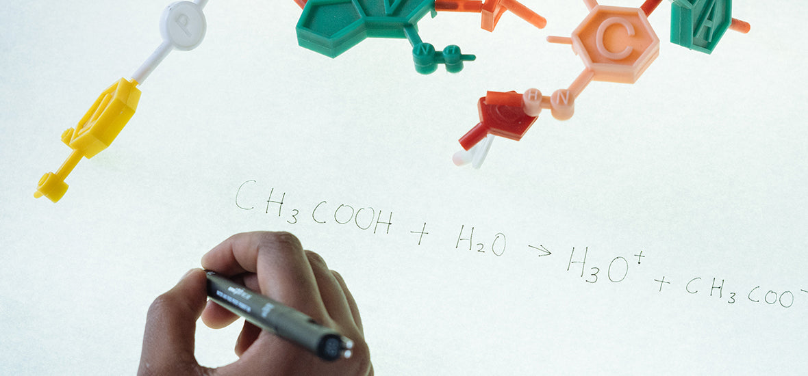 Image of a chain of molecules with a person’s handwriting underneath.