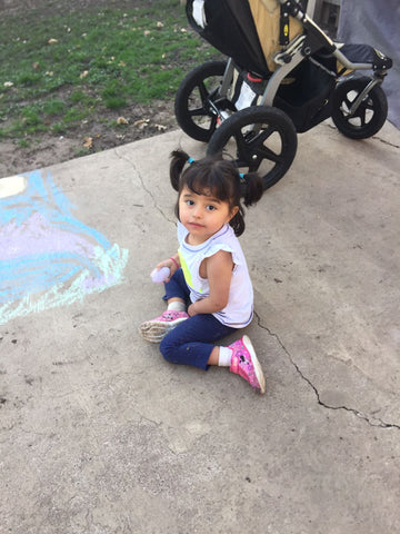 Sara drawing with chalk 