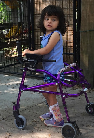 Sara with her purple gait trainer