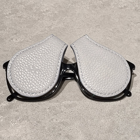 grey-magnetised-lens-protection-on-sunglass-with-grey-background