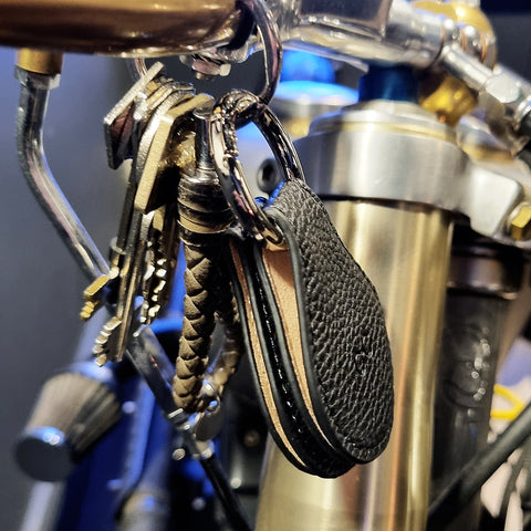 small-glasses-case-on-keys-on-bike
