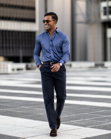 man walking with confidence to job interview wearing midnight micro dot quattro flex dress shirt