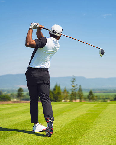 man wearing dress collar polo golf georgia national game